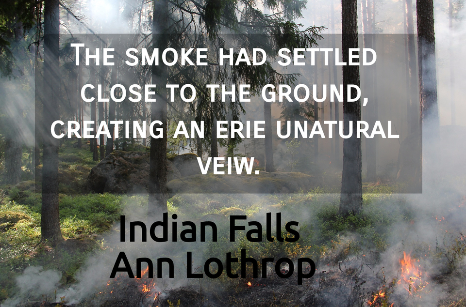 the smoke had settled close to the ground creating an erie unatural veiw...